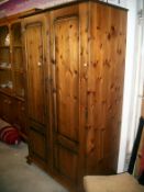 A pine 2 door wardrobe