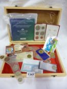 A box of mixed Austrialian coins and presentation sets