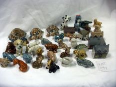 A collection of Wade Whimsies, cottages, dogs etc