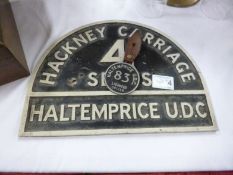 A 1950's Haltemprice U.D.C. aluminium Hackney carriage taxi sign and driver's badge