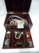 A jewellery box and jewellery (brooches, necklaces etc)
