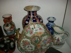 A mixed lot of Oriental vases, plate, jug etc