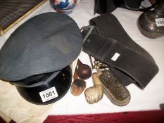 A military cap, belt and 3 old pipes etc