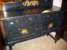 An old sideboard decorated with Chinese dragons