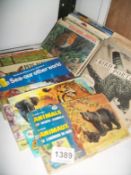 A quantity of Brooke Bond tea cards and Player's cigarette cards in albums