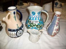 A Portmerion jug, 2 other jugs and a vase