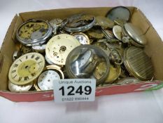 A mixed lot of watch parts for spares