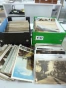 2 boxes of assorted postcards