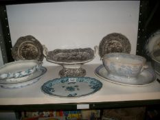 A mixed lot of pottery platters, tureens etc