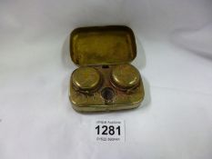 A travelling double inkwell