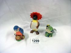 A Beswick Penguin, Beswick Goldfinch and a Royal Doulton Kingfisher