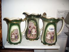 A set of 3 graduated jugs