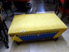 A sarcophagus shaped blanket box