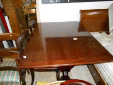 A mahogany refectory table