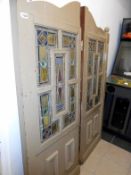 A pair of stained glass doors