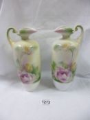 A pair of Victorian hand painted ewers, 1 a/f