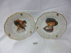 A pair of transfer printed cabinet ribbon plates