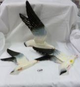 A set of 3 Beswick graduated flying seagulls