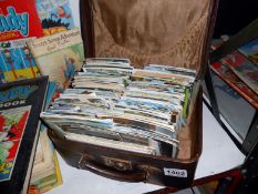 A small suitcase of postcards