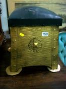 A brass coal bin