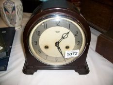 A bakelite mantel clock by Smith's of Enfield