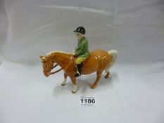 A Beswick boy on pony