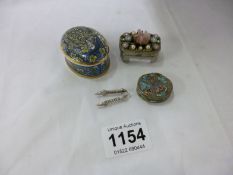 A porcelain pill box and 2 metal pill boxes (1 with tongs)