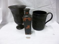 A Wedgwood urn, vase and tankard, urn & tankard repaired