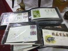 2 folders of first day covers