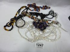 A mixed lot of crystal and other necklaces