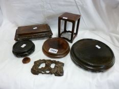7 Oriental wooden stands (one a.f)