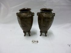 A pair of small  bronzed spelter vases, a/f