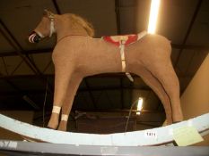 A straw filled rocking horse