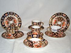 2 Royal Crown Derby Trios and 3 Royal Crown Derby cups and saucers