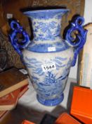 A Regency Ironstone marked blue and white vase, crazed