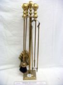 A brass companion set
