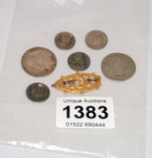 A 1787 George III high grade silver shilling and 9ct gold brooch and other silver coins