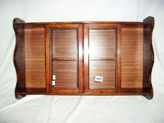 A wall mounting book cabinet