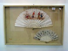 2 Victorian hand painted fans in glass case
