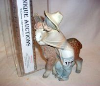 A Lladro boy with donkey