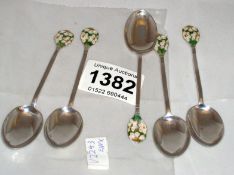 5 silver spoons with enamel daisy handles