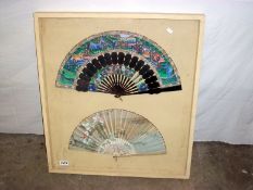 2 Victorian hand painted fans in glass case (one a/f)