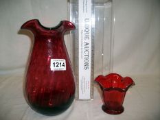 A cranberry glass vase and a ruby glass posy bowl