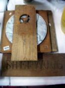 A marble platter on wooden base and 3 other items