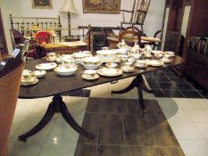 A twin pedestal dining table