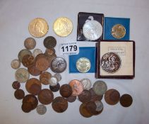 A quantity of mixed coins inc. 2 x Â£5, 2 x Â£2 and some pre 1947 silver coins