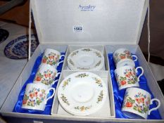 A boxed Aynsley coffee set