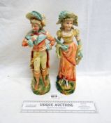 A pair of tall German bisque figurines