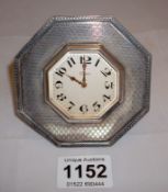 An Art Deco white metal clock (possibly silver)