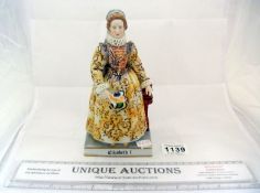A porcelain figure of Queen Elizabeth 1